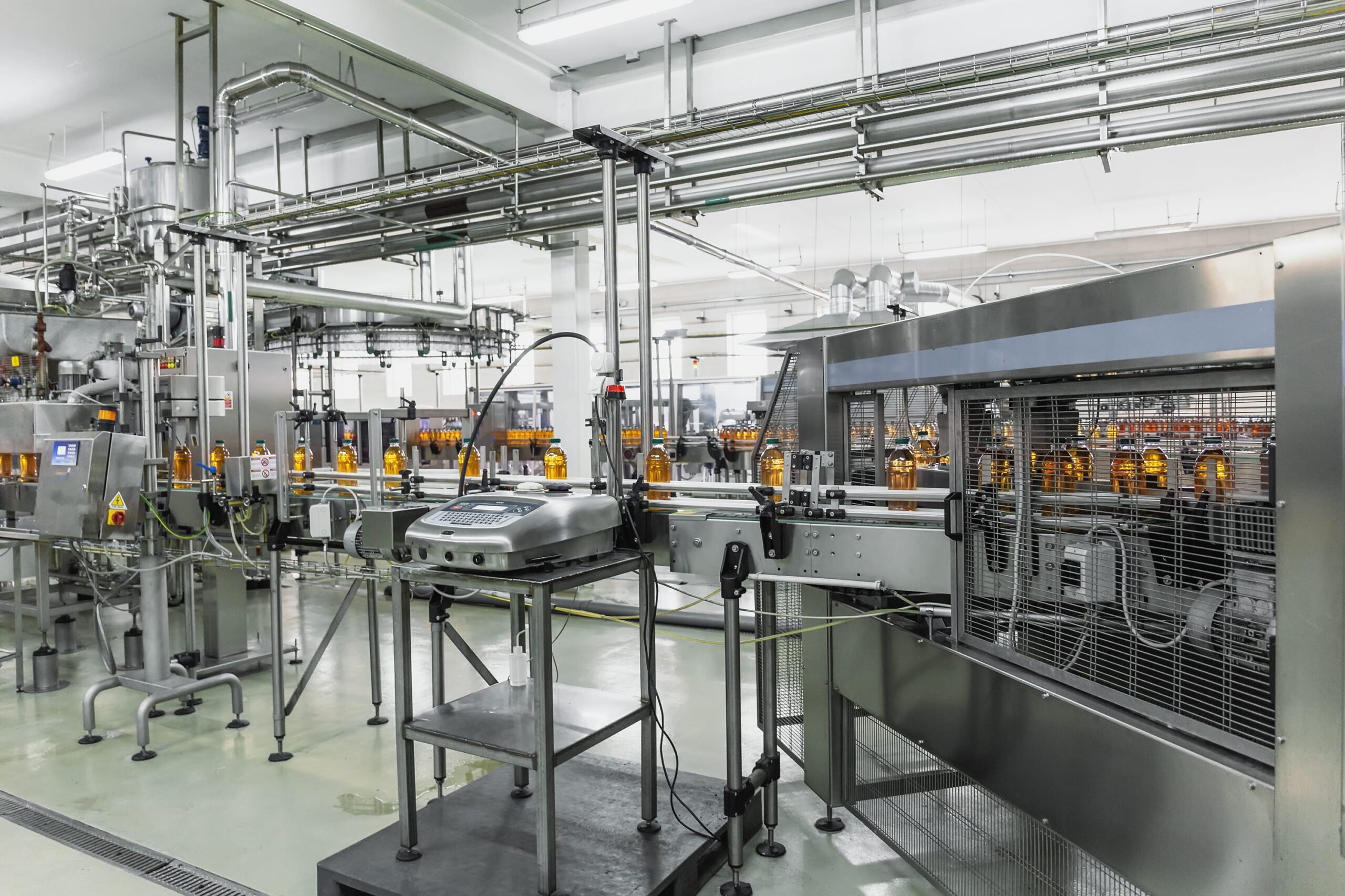 Conveyor system in food and beverage processing plant.