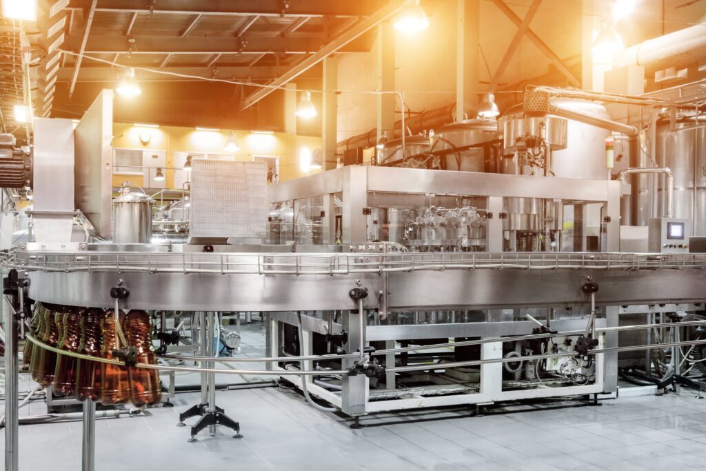 Food conveyor belt in food processing factory.
